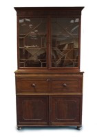 Lot 747 - A George III mahogany secretaire cabinet...