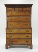 Lot 748 - A George III oak chest on chest, the dentil...