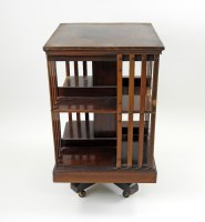 Lot 749 - An Edwardian mahogany revolving low bookcase,...