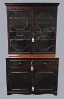 Lot 751 - An early 19th century mahogany high secretaire...