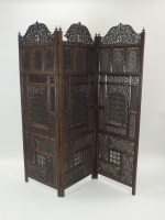 Lot 779 - A Middle Eastern two fold pierced screen ,...