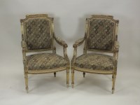 Lot 782 - A pair of Louis XVI style open armchairs,...