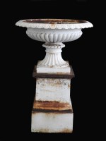 Lot 807 - Two painted cast iron campana urns and plinths,...