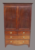 Lot 811 - A George IV mahogany linen press, second...