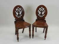 Lot 823 - A pair of early Victorian mahogany hall chairs,...