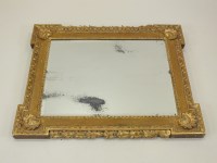 Lot 825 - A gilded wall mirror, mid 18th century and...