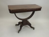Lot 827 - An early 19th century mahogany tea table, the...