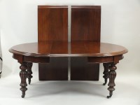 Lot 835 - A Victorian mahogany wind out extending dining...