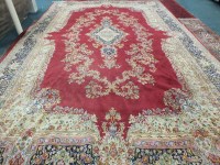 Lot 851 - Kirman carpet South East Iran, the blood red...