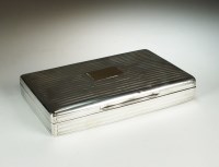 Lot 22 - A silver mounted cigarette box, Mappin & Webb,...