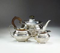 Lot 24 - A Victorian three piece silver tea service,...