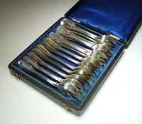 Lot 39 - A collection of French silver oyster forks,...