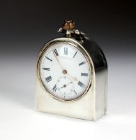 Lot 51 - A silver cased bedside timepiece, FGP,...