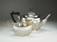 Lot 69 - A Victorian silver teapot and sugar bowl, EH,...