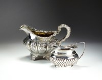 Lot 70 - A George IV Irish silver cream jug, makers...