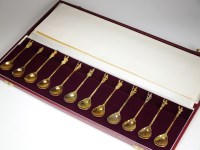 Lot 74 - A cased set of twelve silver gilt spoons 'The...