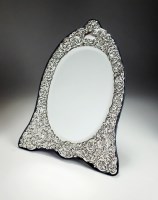 Lot 75 - A Victorian style silver mounted mirror, RBB,...