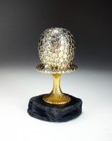 Lot 79 - A silver and gilt surprise Christmas mushroom,...