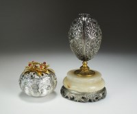 Lot 83 - A white metal surprise Easter egg, by Robert...