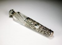 Lot 86 - A silver topped glass scent bottle, the...