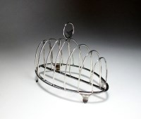 Lot 87 - A George III silver six division toast rack,...