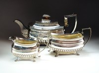 Lot 100 - A George III three piece silver tea service,...