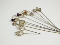 Lot 127 - A collection of silver, white metal and brass...