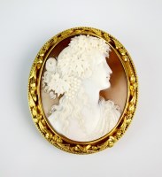 Lot 150 - An oval shell cameo brooch depicting Bacchus,...