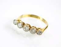 Lot 151 - An early 20th century graduated five stone...