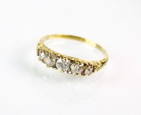 Lot 171 - A five stone graduated diamond ring, the five...