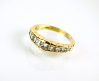 Lot 173 - A graduated nine stone diamond ring, the...