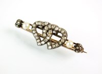 Lot 174 - A late 19th century diamond and pearl bar...