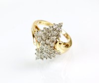 Lot 181 - A 14ct gold diamond cluster ring, designed as...