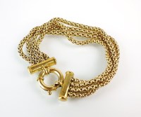 Lot 183 - A 9ct yellow gold four strand chain bracelet,...