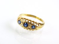 Lot 197 - An early 20th century 18ct gold seven stone...