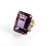 Lot 199 - An amethyst and diamond dress ring, designed...