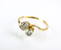 Lot 200 - A two stone diamond crossover ring, the two...