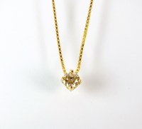 Lot 214 - A single brilliant cut diamond pendant, within...