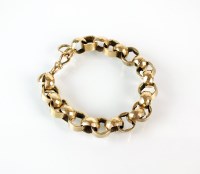 Lot 226 - A yellow metal faceted link bracelet, with...