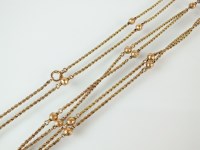 Lot 227 - A double strand rope twist and ball chain...