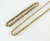 Lot 230 - A yellow metal graduated rope twist necklace,...