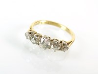 Lot 238 - A five stone graduated diamond ring, the old...