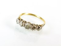 Lot 240 - A graduated five stone diamond ring, the old...