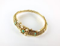 Lot 265 - A turquoise and seed pearl bracelet, designed...