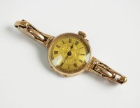 Lot 356 - A Lady's 9ct gold decorative fob watch, the...