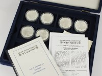 Lot 588 - A cased set of eighteen silver proof £5 coins,...