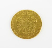 Lot 604 - A George III guinea, dated 1774, fourth...