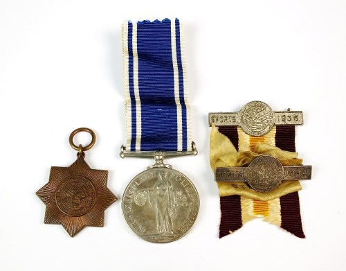 Lot 718 - A Shanghai municipal council emergency medal...