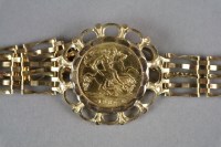 Lot 9 - A half sovereign set bracelet, dated 1982,...
