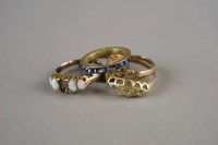 Lot 13 - An 18ct gold sapphire and diamond ring...